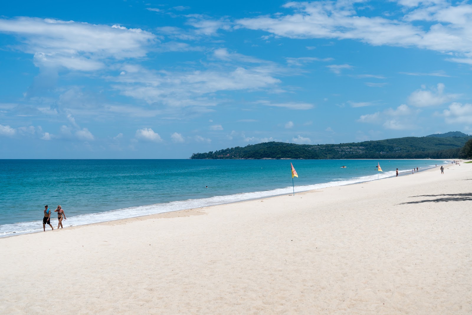 Bang Tao Beach Phuket long stretch of white sand at sunset
